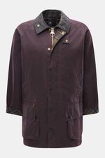 Barbour Wax jacket 'Beaufort Icons' purple shown from the front, made of durable waxed cotton with corduroy collar, tartan lining, multiple pockets, two-way zipper, and snap buttons. A true classic British outdoor jacket with practical, water-repellent fe