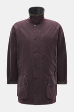Front view of Barbour Wax jacket 'Beaufort Icons' purple, a classic British outdoor waxed cotton jacket with corduroy collar, snap buttons, multiple pockets, and tartan lining. Durable, water-repellent, regular fit with raglan sleeves and robust two-way z