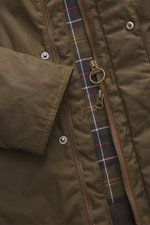 Close-up front view of Barbour Wax parka 'Bedale' brown showing waxed cotton fabric, plaid tartan lining, two-way zip, and snap buttons.