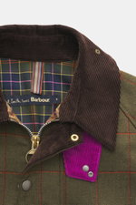 Close-up front view of the Barbour Paul Smith Loves Barbour Beaufort Wool Jacket showing corduroy collar, tartan lining, and zipper details.

Description: <p>Cool collaboration from BARBOUR and PAUL SMITH: The 'Beaufort' wool jacket made of pure wool with