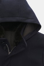 Close-up front view of the Mandelli Cashmere Down Jacket navy hood showing soft cashmere jersey, fur-trimmed stand-up collar, zipper, and button details.