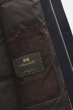Close-up interior view of Mandelli Cashmere Down Jacket navy showing soft suede inner pocket with button, quilted lining, and label.