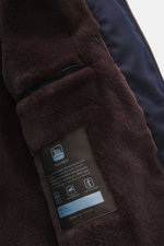 Nahaufnahme des Innenfutters vom Colombo Kid Cashmere Blouson navy mit weichem Nerzfell, Thermometer und Thermo-Technologie-Label.
