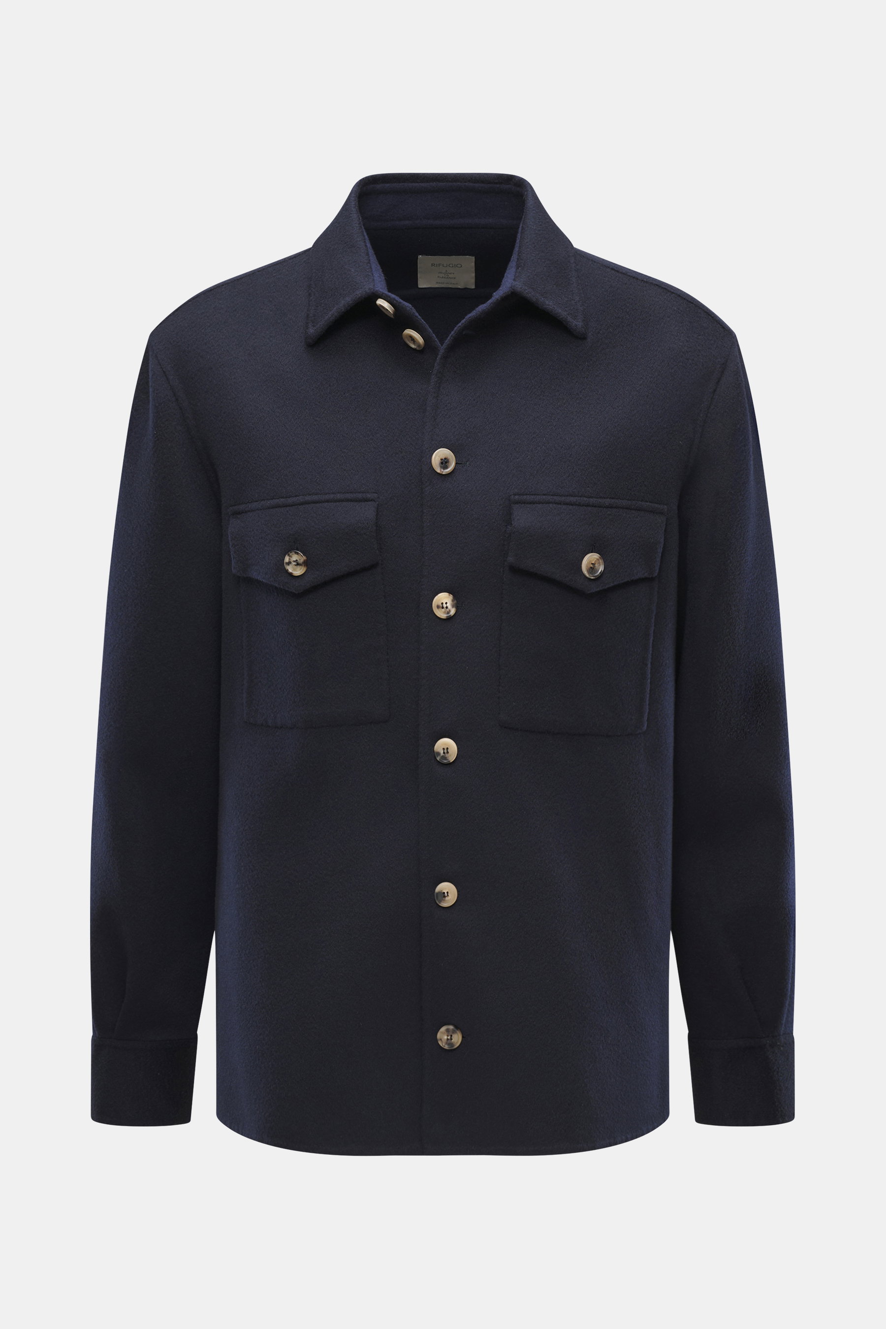 Front view of Rifugio Overshirt navy in a slim fit with soft wool and cashmere mix, featuring a seven-button placket, turn-down collar, patch chest pockets with flaps, cuffs on sleeves, and an unconstructed design.