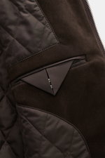 Close-up inside view of the Agnona Cashmere Blouson Dark Brown showing smooth lining fabric, quilted inner pockets, and rib knit details.

Description: <p>Exclusive craftsmanship with sporty sophistication: The Cashmere Blouson by AGNONA combines fine sue