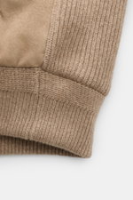 Close-up top-down view of the Agnona Cashmere Blouson taupe showing rib knit sleeves, ribbed cuffs, and fine suede details.