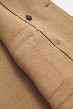 Close-up front angle of the Lunaria Cashmere Cashmere Jacket beige, showing pure cashmere fabric, slim fit, double-breasted three-button style, notch collar, front flap pocket, rear side vents, unlined, and one inside pocket; timeless elegance with a very