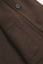 Close-up front view of the Lunaria Cashmere Cashmere Jacket Dark Brown showing its soft pure cashmere fabric, double-breasted three-button style, notch collar, and front flap pocket, highlighting timeless elegance and slim fit design.