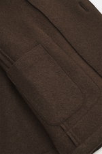 Close-up front detail of the Lunaria Cashmere Cashmere jacket dark brown showing patch pockets and notched collar from a top angle, unlined with slim fit and four-button style.
