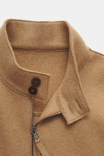 Close-up front view of the Lunaria Cashmere Cashmere Blouson beige showing stand-up collar, two-way zipper, buttons, pure cashmere, very soft touch, slim fit, slanted front pockets, elastic hem and sleeve cuffs, unlined.