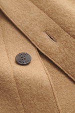 Close-up front view of Lunaria Cashmere Cashmere jacket beige showing pure cashmere fabric with very soft touch, slim fit, five-button style, notched collar, slanted front pockets, and unlined design.
