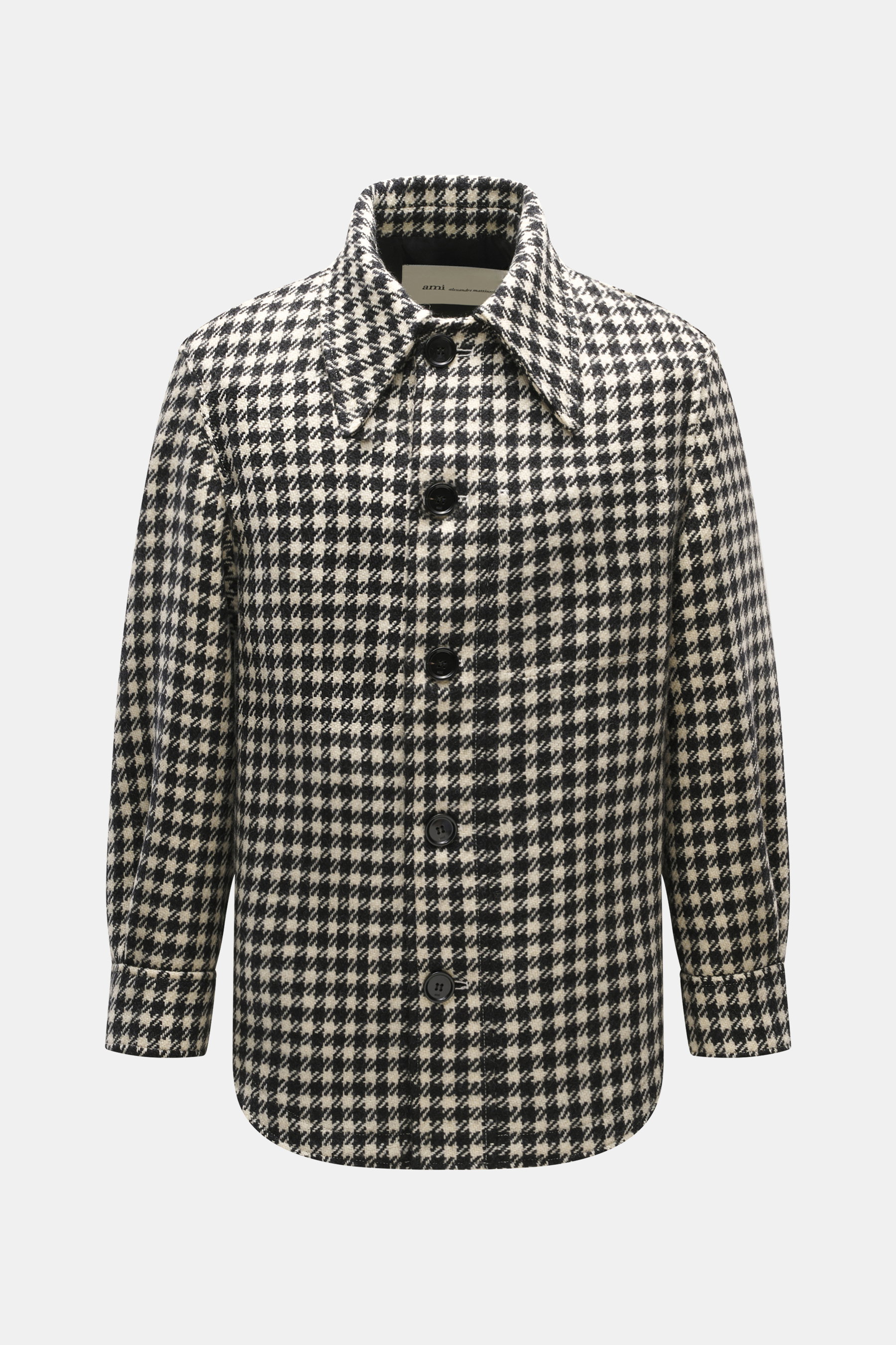Ami Paris Wolljacke schwarz/creme kariert, Mix aus Schurwolle und Microfaser, Regular Fit, Hahnentritt-Muster, fotografiert von vorne mit Umlegekragen, Manschetten und fünf Knöpfen.