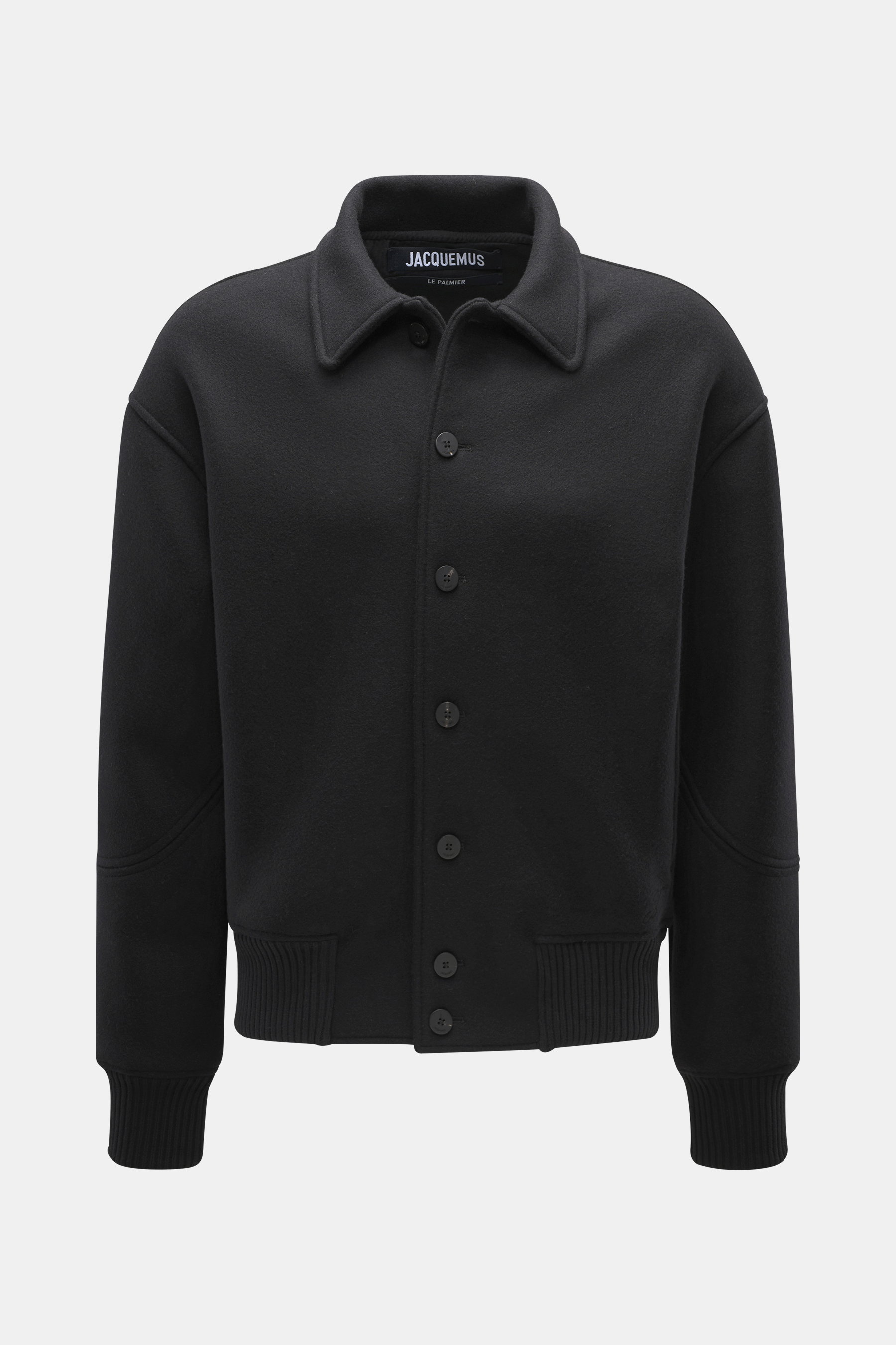 Front view of Jacquemus Blouson black jacket made of pure new wool with a soft touch, oversized fit, turn-down collar, smooth button placket, piped front pockets, and elastic hem and sleeve cuffs.