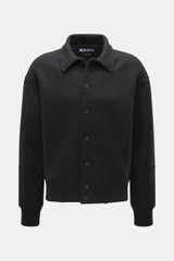Front view of Jacquemus Blouson black jacket made of pure new wool with a soft touch, oversized fit, turn-down collar, smooth button placket, piped front pockets, and elastic hem and sleeve cuffs.
