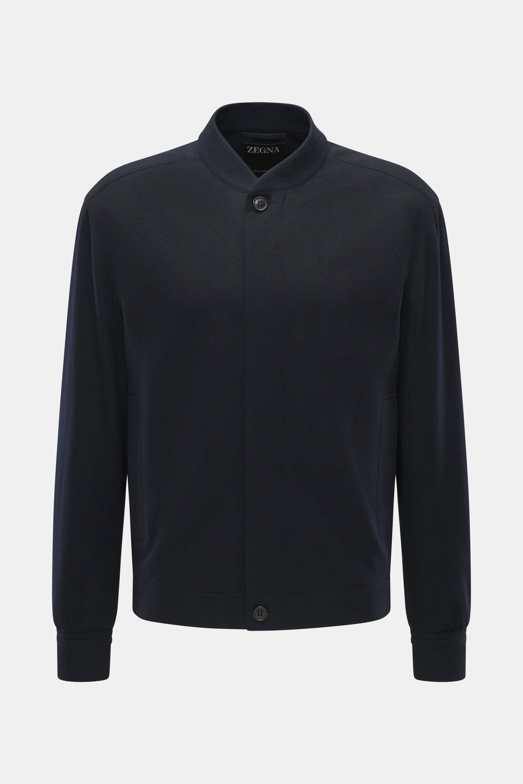 Back view of Zegna Cashmere blouson navy, showcasing soft pure cashmere with rib knit collar, elastic cuffs, and leather back detail.

Description: <p>Comfort and style for the autumn season: This blouson by ZEGNA is made of soft cashmere that has been sp