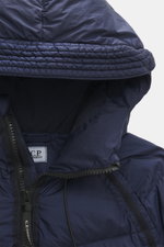 Close-up front view of the C.P. Company Down jacket dark blue hood, showing high-quality ripstop microfiber, lightly textured feel, wind- and water-repellent fabric, warm down filling, garment dyed finish, slim fit design, robust two-way zipper, practical