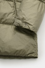 Close-up view of C.P. Company Down jacket olive sleeve and body showcasing ripstop quick-drying microfiber with slightly textured feel, warm down filling, slim fit, garment dyed fabric, durable two-way zipper, hood with drawstring, zippered front pockets,