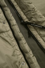 Close-up front view of C.P. Company Down jacket olive showing ripstop quick-drying microfiber, slightly textured feel, warm down filling, slim fit, garment dyed fabric, durable two-way zipper with branded pull, hood with drawstring, zippered front and pat