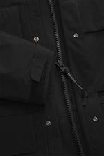 Close-up front view of C.P. Company Parka 'Long Jacket' schwarz in black with high-quality microfiber, two-way zipper, snap closures, and adjustable cuffs.