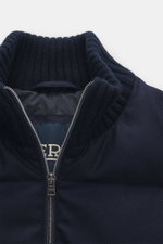 Herno Down jacket navy shown from close-up front angle, featuring elastic virgin wool, soft touch, warm down filling, regular fit, two-way zipper, rib knit collar and sleeve cuffs, patch front pockets, smooth lining fabric, and two inner pockets.