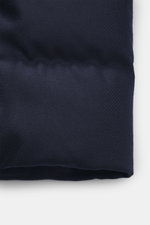 Close-up front view of Herno Down jacket navy showing elastic virgin wool fabric with soft touch, warm down filling, regular fit, two-way zipper, rib knit collar and sleeve cuffs, patch front pockets, smooth lining fabric, and two inner pockets.