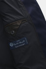 Close-up inside view of Herno Down jacket navy showing elastic virgin wool fabric, soft touch, warm down filling, regular fit, two-way zipper, rib knit collar and sleeve cuffs, patch front pockets, smooth lining fabric, and two inner pockets.