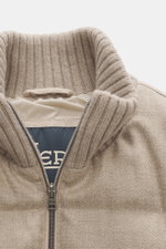 Close-up front view of Herno Down jacket beige showing rib knit collar and two-way zipper, made of elastic virgin wool with soft touch, warm down filling, regular fit, patch front pockets, smooth lining fabric, and two inner pockets.