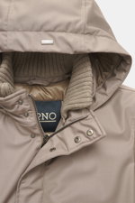 Close-up front view of Herno Down jacket sand showing the hood, removable rib-knit collar trim, two-way zipper, snap buttons, and quilted lining; made of microfiber and viscose mix, soft touch, light down filling, regular fit, wind flap with snap buttons,