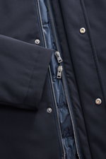 Close-up front view of the Herno Down short coat dark navy, showing high-quality microfiber with a slightly textured feel, light down filling, regular fit, two-way zipper with wind flap, and snap buttons. The hood with drawstring and slanted hip pockets w
