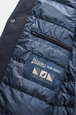 Close-up inside view of the Herno Down short coat dark navy showing high-quality microfiber, slightly textured feel, light down filling, regular fit, two-way zipper, wind flap, hood with drawstring, slanted hip pockets with zipper, smooth lining fabric, a