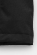 Black close-up of fabric texture and stitching on the Herno Down jacket black, showing mix of wool and microfiber, soft touch.