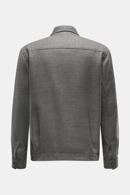 Back view of Briglia 1949 Jacket 'Bill' dark grey melange in pure new wool with slim fit, turn-down collar, two-way zipper, cuffed sleeves, slant welt pockets, smooth lining, and one inside pocket, showing its slightly textured feel.