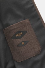 Close-up of the interior lining and pocket of the Briglia 1949 Jacket 'Bill' grey brown melange, photographed from above, showing pure virgin wool fabric with a slightly textured feel, slim fit, turn-down collar, two-way zipper, cuffed sleeve ends, slante
