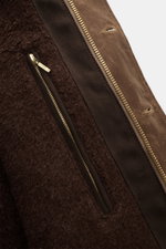 Close-up inside view of Manifattura Ceccarelli Waxed jacket 'Deck Jacket' brown showing super-soft alpaca wool lining, robust zip, and water-repellent waxed cotton fabric.