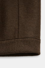Close-up front view of Harris Wharf London Wool jacket dark brown, showing felted virgin wool texture and seam details.

Description: Casual and cosy: This cropped wool jacket by HARRIS WHARF LONDON, made of felted virgin wool, has a clean silhouette and 