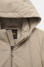 Close-up front view of the beige hood and zipper of the Moorer Daunenjacke 'Albini' navy, a luxurious, water-repellent slim fit jacket with detachable hood, warm down filling, and soft viscose-microfiber blend fabric.
