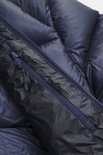 Close-up view of Polo Ralph Lauren Down Jacket Navy showcasing ripstop high-quality microfiber, smooth feel, warm down filling, collar-high zipper, zippered front pocket with RL logo pull, elastic sleeve cuffs, tonal logo stitching, adjustable hem width, 
