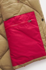 Close-up view of the interior red zippered pocket and beige quilted lining of the Polo Ralph Lauren Down Blouson Red, showing detailed stitching and snap button. 

<p>Preppy through the cold season: this quilted blouson by POLO RALPH LAUREN keeps you warm