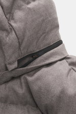 Close-up side view of the detachable hood and zipper of the UBR Merino Down Jacket 'Savile' grey-brown melange, made from pure merino wool with warming down filling, slim fit, two-way zipper, high-closing stand-up collar, quilted look, piped zipper front 