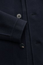 Close-up front view of the 04651/ A trip in a bag Jacket 'Double Blouson' navy in aviator style, showing dark navy wool blend fabric, four-button placket, and turn-down collar with lambskin trim. Eyecatcher for the transitional season: The lightweight jac