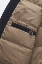 Close-up side view of the Eddy Monetti Cashmere down blouson 'Teos' beige showing quilted fabric, leather-piped hip pocket, and branded button.

Description: <p>Lightweight, pleasantly warming quality: The sporty blouson 'Teos' features a high-quality dow