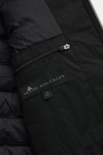 Close-up front-right interior view of the Moose Knuckles Down jacket 'Northdale' black with zippered chest pocket, microfiber, down filling, and logo patch.