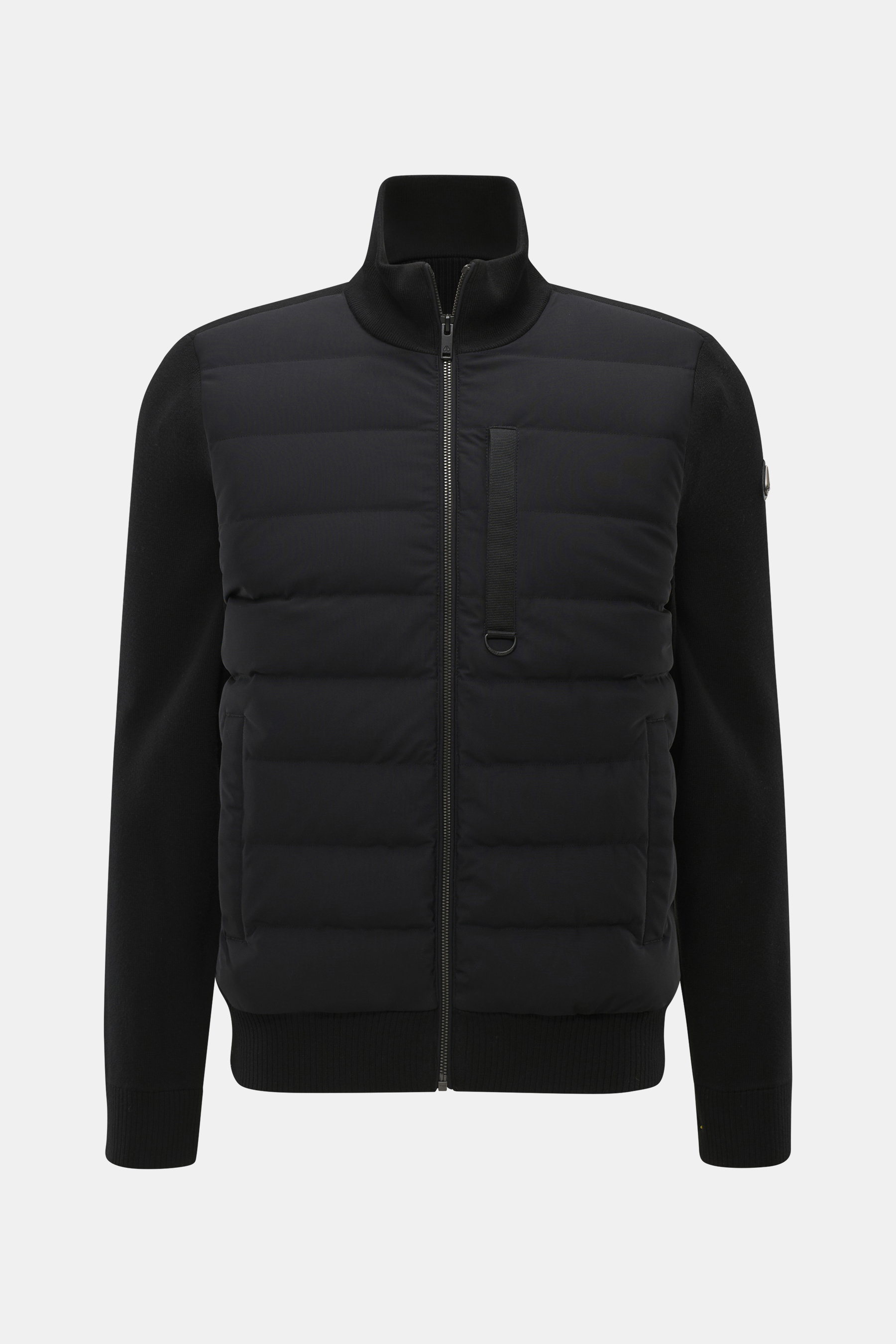Front view of Moose Knuckles Down Blouson 'Kamet Hybrid' black, made of viscose and microfiber, knitted back and sleeves, soft touch, slim fit, robust two-way zipper, high closing ribbed collar, typical metal logo on upper arm, slanted hip pockets, light 