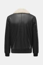 Alt tag (125 characters max):  
Back view of Moose Knuckles Leather blouson 'Toba Bomber' black with lambskin collar, smooth leather, and ribbed cuffs and hem.

Detailed description:  
<p>Perfect for urban winter looks: The 'Toba Bomber' blouson from MOOS