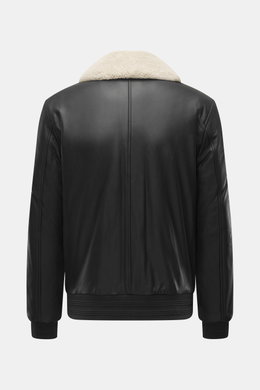 Alt tag (125 characters max):  
Back view of Moose Knuckles Leather blouson 'Toba Bomber' black with lambskin collar, smooth leather, and ribbed cuffs and hem.

Detailed description:  
<p>Perfect for urban winter looks: The 'Toba Bomber' blouson from MOOS