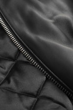 Close-up front view of the Moose Knuckles Leather blouson 'Toba Bomber' black showing fine lamb leather, smooth texture, and zipper detail.

Description: 
<p>Perfect for urban winter looks: The 'Toba Bomber' blouson from MOOSE KNUCKLES made of fine leathe