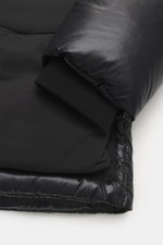 Close-up side view of Moose Knuckles Down jacket 'Briar 3Q' black sleeve showing high-quality microfiber, smooth touch, wind- and water-repellent fabric, slim fit, warm down filling, two-way zipper, hood with drawstring, patch front pockets with flap, met