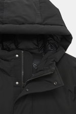 Close-up, top-front view of the Moose Knuckles Down jacket 'West-Ed 3Q' black showing the lined hood, two-way zipper, wind flap with buttons, and high-quality microfiber with smooth touch, wind- and water-repellent fabric, warm down filling, regular fit, 