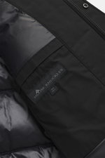 Close-up, inside view of the Moose Knuckles Down jacket 'West-Ed 3Q' black showing high-quality microfiber, smooth touch, warm down filling, shiny lining fabric, and one inside pocket.