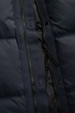 Close-up front view of Stone Island Daunenweste 'Seamless Tunnel Nylon Down' navy, showing durable YKK zipper, snap buttons, and smooth, wind- and water-repellent microfiber fabric with stitched down chambers for warmth and lightweight comfort.